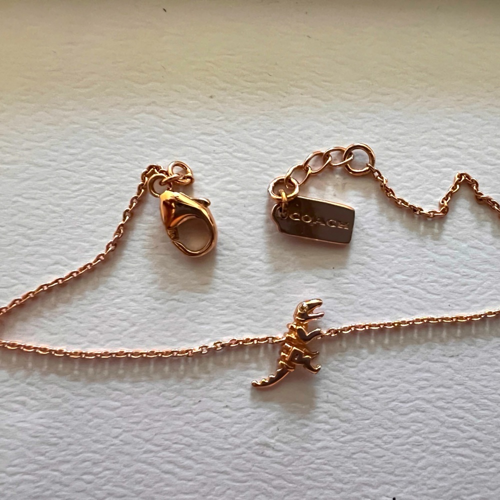 Coach dinosaur tennis bracelet